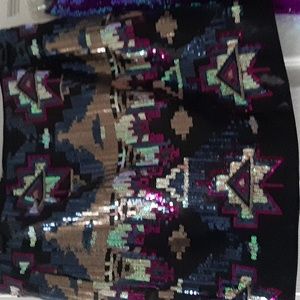 Sequin short skirt fully lined with invisible zipper.